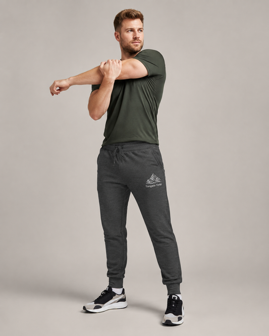 Adult Unisex Fleece Joggers - Embroidered Tangata Tiriti - mā (white) embroidery