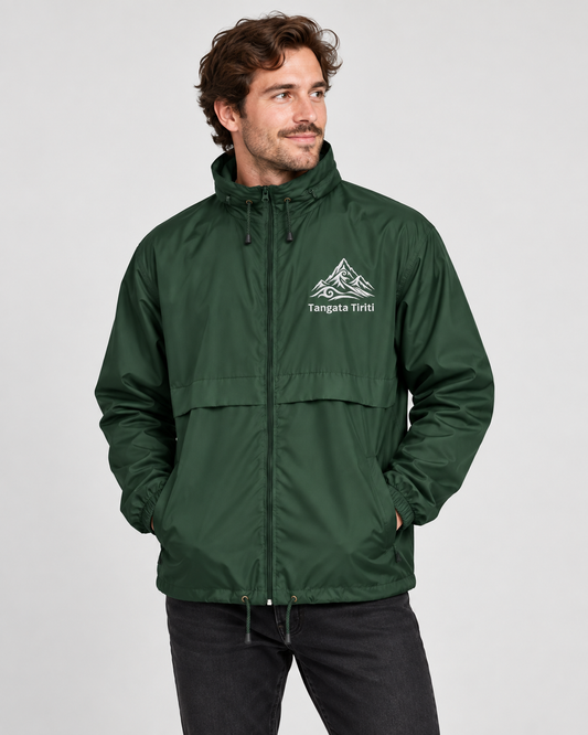 Unisex windbreaker - Embroidered Tangata Tiriti - mā (white) embroidery
